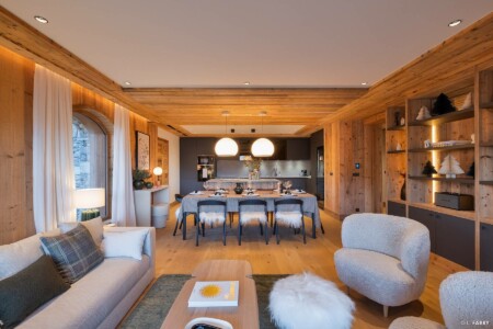 Photographie immobilière à Courchevel : salon d'un appartement dans le chalet le Manej