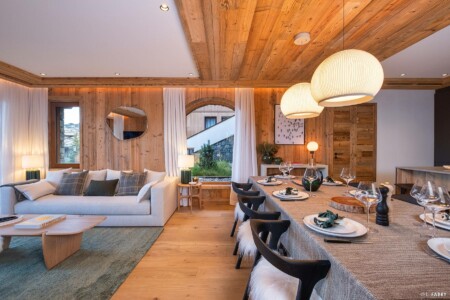 Photographie immobilière à Courchevel : salon d'un appartement dans le chalet le Manej